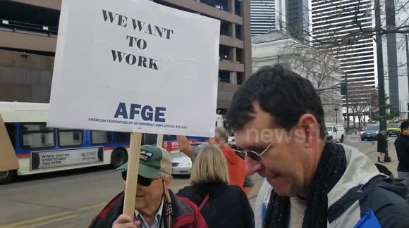 Federal workers protest government shutdown in downtown Denver