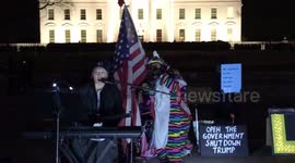 Protesters sing a Trump parody song in front of the White House on Day 180 of the #KremlinAnnex protests.