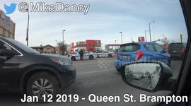 police push car into bus stop