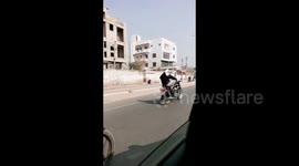Man shows off his stunt on a Motorcycle in Rajasthan