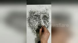 Art teacher uses cigarette ash to draw Albert Einstein