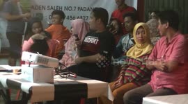 Crowd of disabled supporters gather to watch Indonesian presidential debate