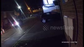 Robber hurls slates at police and sets fire to his trousers during stand-off