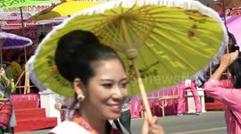 Thailand umbrella festival with beauty contestants
