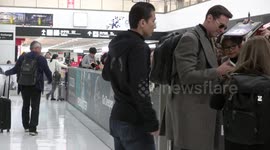 Hugh Jackman mobbed by fans as he arrives in Japan