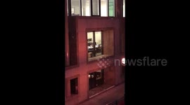 RAW FOOTAGE: Busy day at work? Office worker spotted procrastinating from a distance