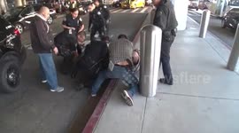 allegedly man hit a cop at lax