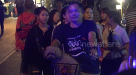 Dog ride's in owner's bicycle basket