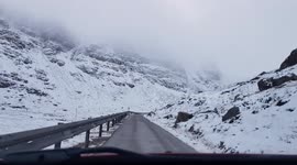 Beautiful snowy Highland road filmed at Bealach na Bà