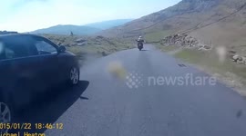 Man takes motorbike through road 'The Struggle' and Kirkstone Pass