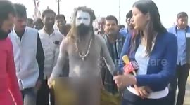 Reporter questions Naga Saint for wearing scarf around his waist, enraged holy man takes it off in a huff