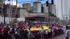 Venezuelans hold a protest against Nicolas Maduro