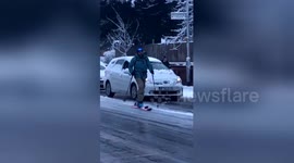 Manchester man skis past gridlock caused by icy roads