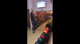 Girl throws bowling ball the wrong way in hilarious fail