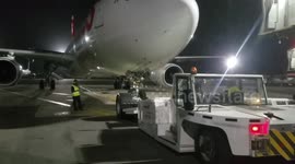 SWISS AIR AIRBUS 330 DRIVEN BY PUSHBACK AT JULIUS NYERERE  INTERNATINAL AIRPORT TANZANIA