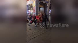 Chinese man gets into 'epic battle' with men dressed as fairytale charactes