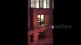 RAW FOOTAGE: Busy day at work? Office worker spotted procrastinating from a distance