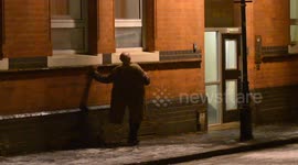 A man makes his way back to his home after a very heavy night in Birmingham, UK