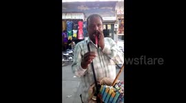 Flute seller in India shows off hilarious mimicking abilities using his flutes