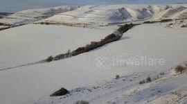 Walker astonished when he stumbles upon an enormous owl-shaped 'snow circle'