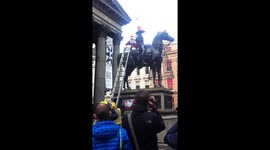 Santa arrested in Glasgow for riding on duke of Wellington statue