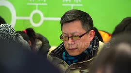 People compete to stay still & silent for iPhone 6 in China