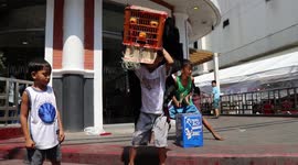 Filipino kids improvise for Chinese New Year costumes