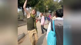 Unique way of dancing by American citizen stuns onlookers in Northern India.