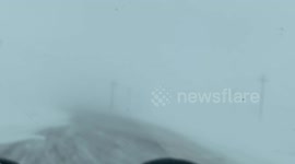 White-out conditions cover road in Minnesota