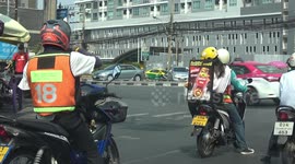 Entrepreneurial motorcycle rider makes his own mobile billboard