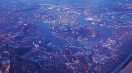 Flying above O2 and Canary Wharf in London