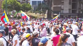Venezuelans walking to hear Juan Guaido speak