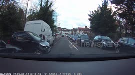 'Smart car, dumb driver'? Tiny car parks horizontally holding up traffic in London