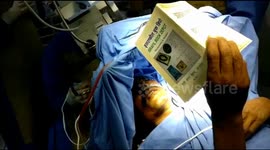 Awake opertion to remove brain tumour to  save paitent speach while reading holy book in India.