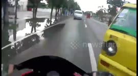 Motorcyclist has scary near miss on Philippines road