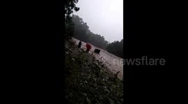 video image when the car was dragged into the flood with the driver