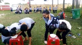 The challenge to eat wheat flour by mouth to find the candy hidden in the bowl of flour
