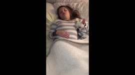 Dog and kid fall asleep in matching pyjamas