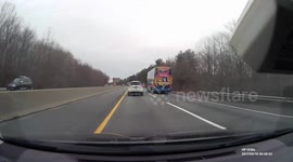 Newsflare Edit - Bald eagles fight, then land on highway.