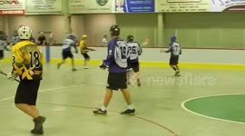 Box Lacrosse players in fight action