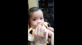 Her first taste of lemon..wait for it haha.. so cute