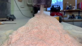 Oddly mesmerising footage sees sawdust sucked through vacuum