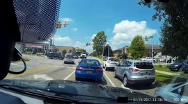 Dashcam - Left Turn Confusion at Intersection due to Truck with Trailer Running Red Light