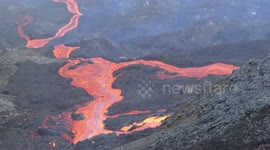 Brave hiker captures rivers of lava erupting from volcano on French-controlled island