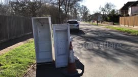 Fridges fly tipped on a residential street.