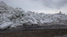 Tsunami of ice blown on shore in wild weather and severe wind storm on Fort Erie Canada