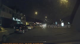 Driver speeds through a red light on new years eve