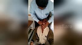 A pair of pliers and some cotton balls: Crook dentist treats man who can't afford proper tooth care