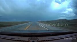 Arizona driver's dash-cam captures lightning strike in distance