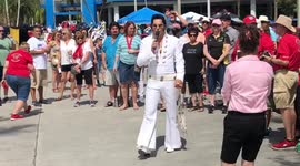 Elvis Presley Impersonator Sings Kentucky Rain at Auto Show for Charity